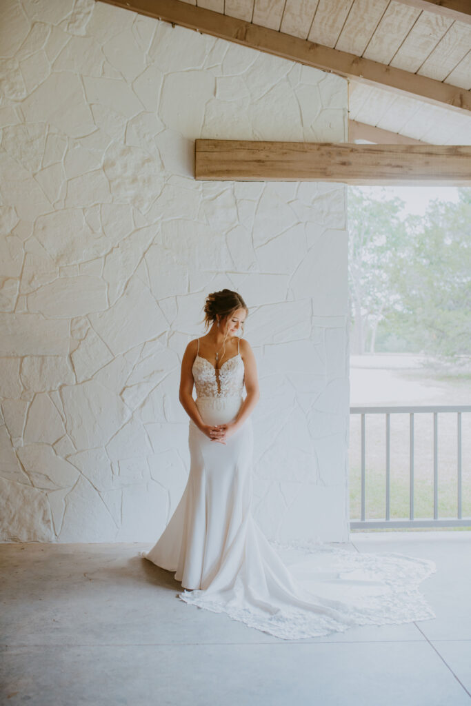 photo of the Bride showcasing her dress