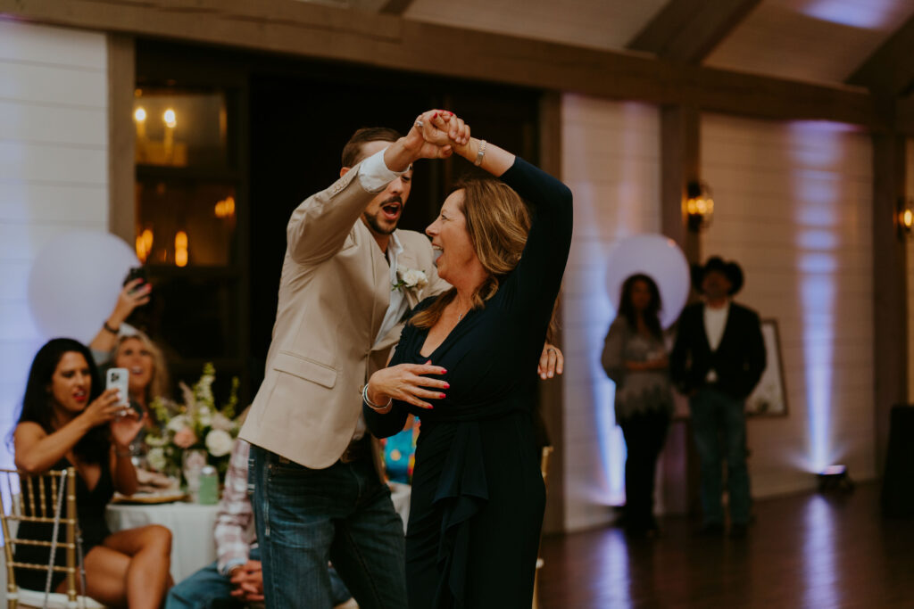Groom and mother dance at the Black Oak